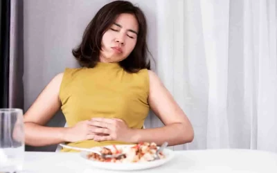 Malaise après les repas : comprendre et gérer les sensations d’inconfort
